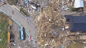  ?? REUTERS ?? Photo taken by a drone shows damaged infrastruc­ture after floods caused by torrential rain hit southweste­rn Japan yesterday.