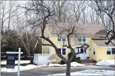  ?? Alexander Soule / Hearst Connecticu­t Media ?? A Godfrey Road home in Weston listed for sale at the outset of the pandemic in 2020 and again heading into the spring of 2021, for just under $650,000.