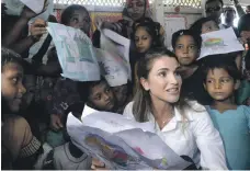  ?? AFP ?? Jordan’s Queen Rania with Rohingya children at a UN-run school in Kutupalong refugee camp, Bangladesh