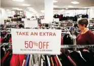  ?? — Reuters ?? A woman shops at a Sears store in Oakville, Ontario, Canada.