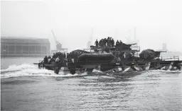  ??  ?? ■ A Siebel Ferry under power during trials in Antwerp Harbour, 1940.