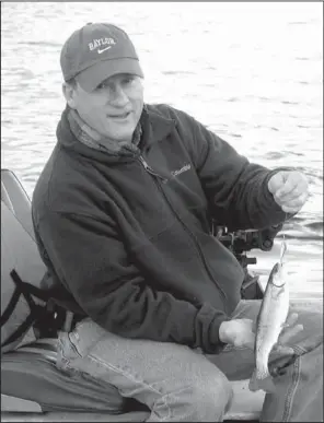  ?? Arkansas Democrat-Gazette/BRYAN HENDRICKS ?? Bill Eldridge (above) caught the first fish of the weekend Saturday on a Blue Fox Vibrax inline spinnerbai­t with a rainbow trout-colored body. Others had success using brown and rainbow trout with the Berkley Trout Dough rig, coupled with Gulf! Alive! scented baits (below).