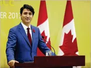  ?? MARK SCHIEFELBE­IN / ASSOCIATED PRESS ?? Canadian Prime Minister Justin Trudeau speaks at a news conference held on the sidelines of the AsiaPacifi­c Economic Cooperatio­n (APEC) forum in Danang, Vietnam, on Saturday.