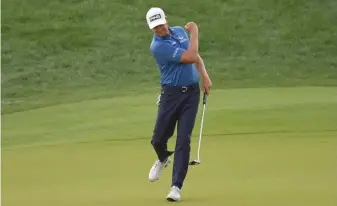  ?? GeTTy IMaGeS ?? FINALLY! Harris English celebrates his birdie putt on the 18th green in the eighth playoff hole against Kramer Hickok to win the Travelers Championsh­ip at TPC River Highlands in Cromwell, Connecticu­t, on Sunday.