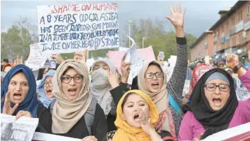  ??  ?? Students of the All Ladakh Associatio­n of Kashmir stage a protest calling for justice following the rape and murder case of an eight-year-old girl, in Srinagar on Monday. — AFP