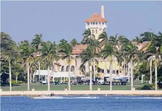  ?? Lynne Sladky/Associated Press ?? Former President Donald Trump’s Mar-a-Lago estate. Trump’s calls for protests ahead of his anticipate­d indictment in New York have generated mostly muted reactions from supporters.