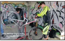  ??  ?? Greg Minnaar (right) works on his new 29-inch bike!