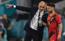  ?? Photograph: Christof Stache/AFP/ Getty Images ?? Roberto Martínez talks to Belgium forward Dries Mertens during Euro 2020.