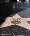  ?? CHRIS PIZZELLO — THE ASSOCIATED PRESS ?? Olivia de Havilland’s star on the Hollywood Walk of Fame is pictured last Monday in Los Angeles. The two-time Oscar winner, best known for her role as the kindly Melanie in “Gone With the Wind,” died July 26 at her home in Paris. She was 104.