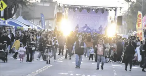  ?? SHARON BURNS PHOTO ?? A crowd forms and dances to the live band during the Mardi Gras Street Fair 2023 held Saturday, February 18, in El Centro.