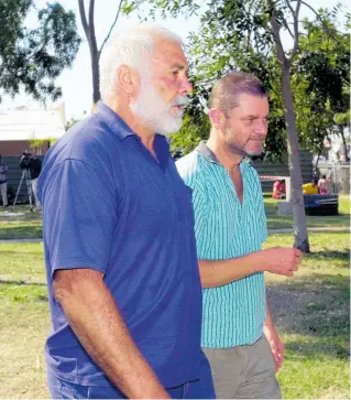  ?? Photo / Getty Images ?? Keith Murdoch leaves the Tennant Creek Court in July 2001 with friend Sonny Reid after being summonsed to appear at a Coroner’s inquest into the mysterious death of an Aboriginal man.