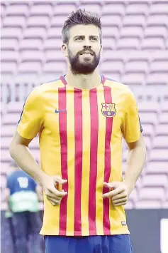  ?? — AFP photo ?? Barcelona’s defender from Spain Gerard Pique warms up before the Spanish league football match FC Barcelona vs UD Las Palmas at the Camp Nou stadium in Barcelona on October 1, 2017.