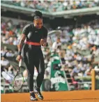  ?? ALESSANDRA TARANTINO ASSOCIATED PRESS ?? Serena Williams celebrates after scoring a point against Krystina Pliskova of the Czech Republic on Tuesday during their first round match of the French Open at the Roland Garros stadium in Paris.