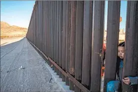  ?? PAUL RATJE/GETTY-AFP ?? The barrier near El Paso, Texas. The Supreme Court ruled that opponents of President Trump’s shift of money for a border wall did not have standing to challenge the transfer.