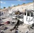  ?? AFP ?? Syrians check wreckage after an airstrike by pro-regime forces on Idlib province on Saturday.