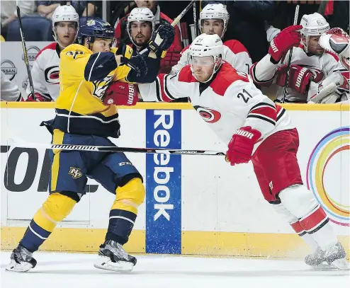  ?? SANFORD MYERS / GETTY IMAGESS FILES ?? Defenceman James Wisniewski, right, in 2015 during his stint with the Carolina Hurricanes.