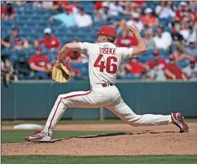  ?? Craven Whitlow/Special to the News-Times ?? Bringing the heat: Arkansas' Barrett Loseke throws a pitch during the Razorbacks' 9-7 win over Alabama Sunday at Baum Stadium in Fayettevil­le. This weekend, the Razorbacks head to LSU for a three-game series starting Friday.