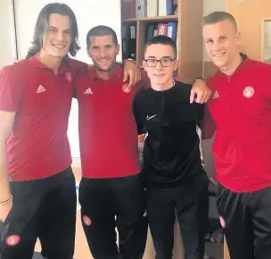  ??  ?? Fan Teenager Joshua enjoyed meeting Hamilton Accies players Markus Fjortoft, Alex Gogic and Adrian Beck