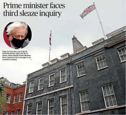  ?? AP ?? Flags fly from the roof of No 10 Downing Street, right, and No 11, below, where Britain Prime Minister Boris Johnson’s flat is thought to be located in London.