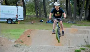  ?? STEPH RANGI/FAIRFAX NZ ?? Tawhirimat­ea Southwick-Hazelden shows off the skills he’s learnt since joining Kids on Bikes.