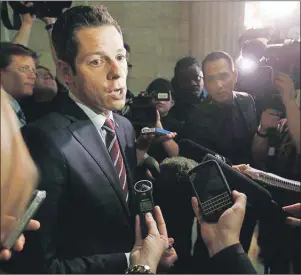  ?? CP PHOTO ?? Winnipeg mayor Brian Bowman speaks to media after Manitoba Finance Minister Greg Dewar read the 2015 budget for the province at the Manitoba Legislatur­e in Winnipeg earlier this year.