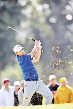  ?? — AFP photo ?? Jordan Spieth hits out of the rough on the ninth hole during round one of the Northern Trust Open at Riviera Country Club on February 18, 2016 in Pacific Palisades, California.