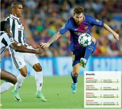  ?? Reuters ?? Barcelona’s Lionel Messi in tussle with Juventus’ Douglas Costa and Blaise Matuidi during the Champions League match. —