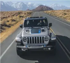  ??  ?? To accompany the hybrid Wrangler 4xE next year, Jeep has plans to install solar charging stations across the UAE’s deserts Jeep