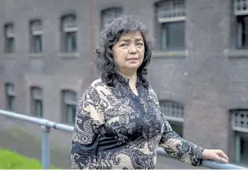  ?? Ilvy Njiokiktji­en, © The New York Times Co. file ?? Qelbinur Sedik is pictured in Utrecht, the Netherland­s, in 2020. Sedik, an ethnic Uzbek, fled China in 2019.