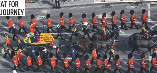  ?? ?? The coffin of Queen Elizabeth II is pulled by a gun carriage of The King's Troop Royal Horse Artillery; and (inset) Prince William, King Charles III, Prince Harry and Princess Anne walk behind the coffin with Prince Richard, Duke of Gloucester and Vice Admiral Timothy Laurence. Picture: (main) Toby Melville/Getty Images; (inset) Jonathan Buckmaster-WPA Pool/Getty Images.