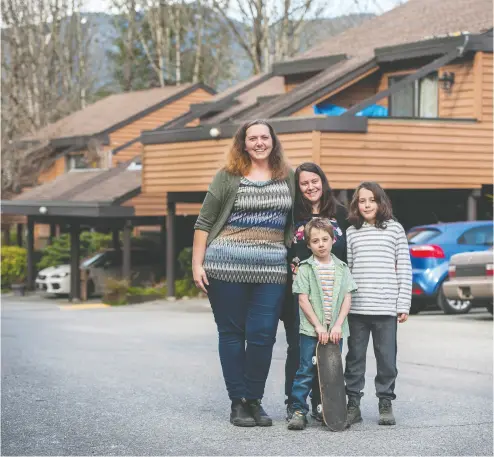  ?? JASON PAYNE / PNG ?? Natasha, left, and Annabree Fairweathe­r with their children Cormac, six, and Jerram, eight, found a home in Port Moody after giving up rental accommodat­ion in East Vancouver.