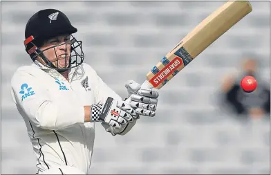  ??  ?? New Zealand’s Henry Nicholls brought ip his halfcentur­y in thethe 17 balls bowled on day three