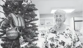  ?? MIKE ZETTEL FORT ERIE POST ?? Helen Eggleton, convener of Douglas Memorial Hospital Auxiliary's Tree of Lights campaign, is helping spread festive cheer inside the tuck shop.