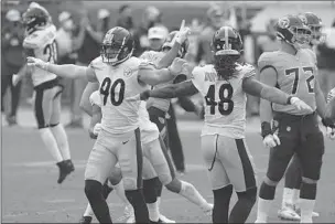  ?? MARK ZALESKI/AP ?? The Steelers celebrate after Titans kicker Stephen Gostkowski misses a field goal late in Sunday’s game.