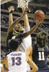  ?? NHATV. MEYER/STAFF ?? West Virginia’s Daxter Miles Jr. drives in for a shot against Gonzaga’s Josh Perkins.