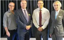  ??  ?? Celebratin­g are (from left) chaplain coordinato­r Evan Reichelt, deputy vice-chancellor (students and communitie­s) Carl Rallings, multicultu­ral coordinato­r William Conwell and Dr Krzysztof Batorowicz.