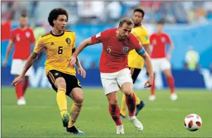  ?? AP PHOTO ?? Belgium’s Axel Witsel, left, and England’s Harry Kane challenge for the ball during Saturday’s third-place match in St. Petersburg.