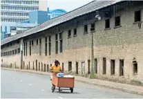  ??  ?? File picture of a deserted street in Colombo during a lockdown.