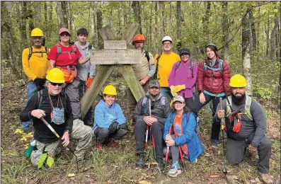  ?? (Special to the Democrat-Gazette/Danny Owens) ?? Volunteers provide most of the maintenanc­e for the Ouachita Trail.