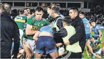  ?? DIARMUID GREENE/ SPORTSFILE ?? A melee breaks out between Dublin and Kerry players after the final whistle in Tralee on Saturday night