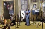  ??  ?? A model presents a creation of the Gucci ‘Cruise’ collection, at the Pitti Palace in Florence, Italy.