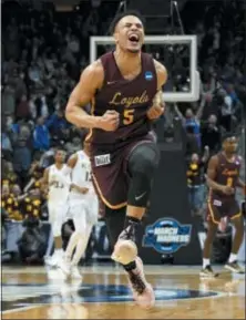  ?? THE ASSOCIATED PRESS ?? Loyola-Chicago guard Marques Townes celebrates after making a 3-pointer in the final minute of the team’s 69-68 victory over Nevada in the regional semifinals on