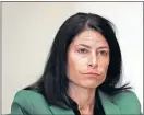  ?? SANCYA/ THE ASSOCIATED PRESS] ?? Michigan Attorney General Dana Nessel listens to a question from reporters June 4 in Detroit. [PAUL