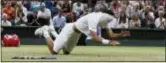  ?? KIRSTY WIGGLESWOR­TH — THE ASSOCIATED PRESS ?? Brazil’s Marcelo Melo falls to the ground with his shirt covering his face as he celebrates winning the men’s doubles with Poland’s Lukasz Kubot. title