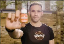  ?? ?? Hal RobsonKanu holds up one of his The Turmeric Co shots