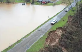  ?? DAVID BATTALY/MISSISSIPP­I EMERGENCY MANAGEMENT AGENCY VIA AP, FILE ?? An aerial photo shows a potential dam/levee failure in Yazoo County, Miss.