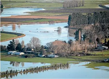  ?? PHOTO: GEORGE HEARD/STUFF ?? About 90 per cent of John Parks’ property on the Taieri plains near Dunedin is covered in water.