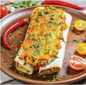  ?? Foto: Aleksandr Tkach, Fotolia ?? Enchiladas sind weiche Teigfladen mit Käse überbacken. Sie sind meist mit Chili gewürzt.