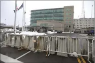  ?? TINA MACINTYRE-YEE ?? Barricades are in place in front of the Public Safety Building in preparatio­n for the grand jury announceme­nt on whether the police officers will be indicted in the actions that lead to Daniel Prude’s death on Tuesday, Feb. 23, 2021, in downtown Rochester, N.Y.