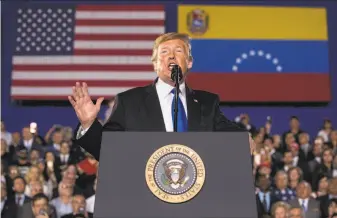  ?? Andrew Harnik / Associated Press ?? President Trump assails Venezuelan President Nicolás Maduro during his address at Florida Internatio­nal University. Trump is trying to boost support for opposition leader Juan Guaidó.